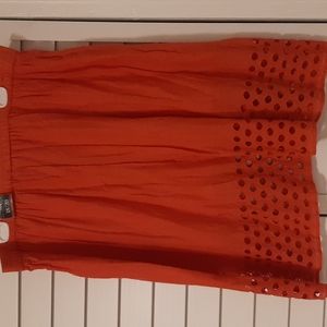 A beautiful coral orange skirt by Avenue. Size 18/20.